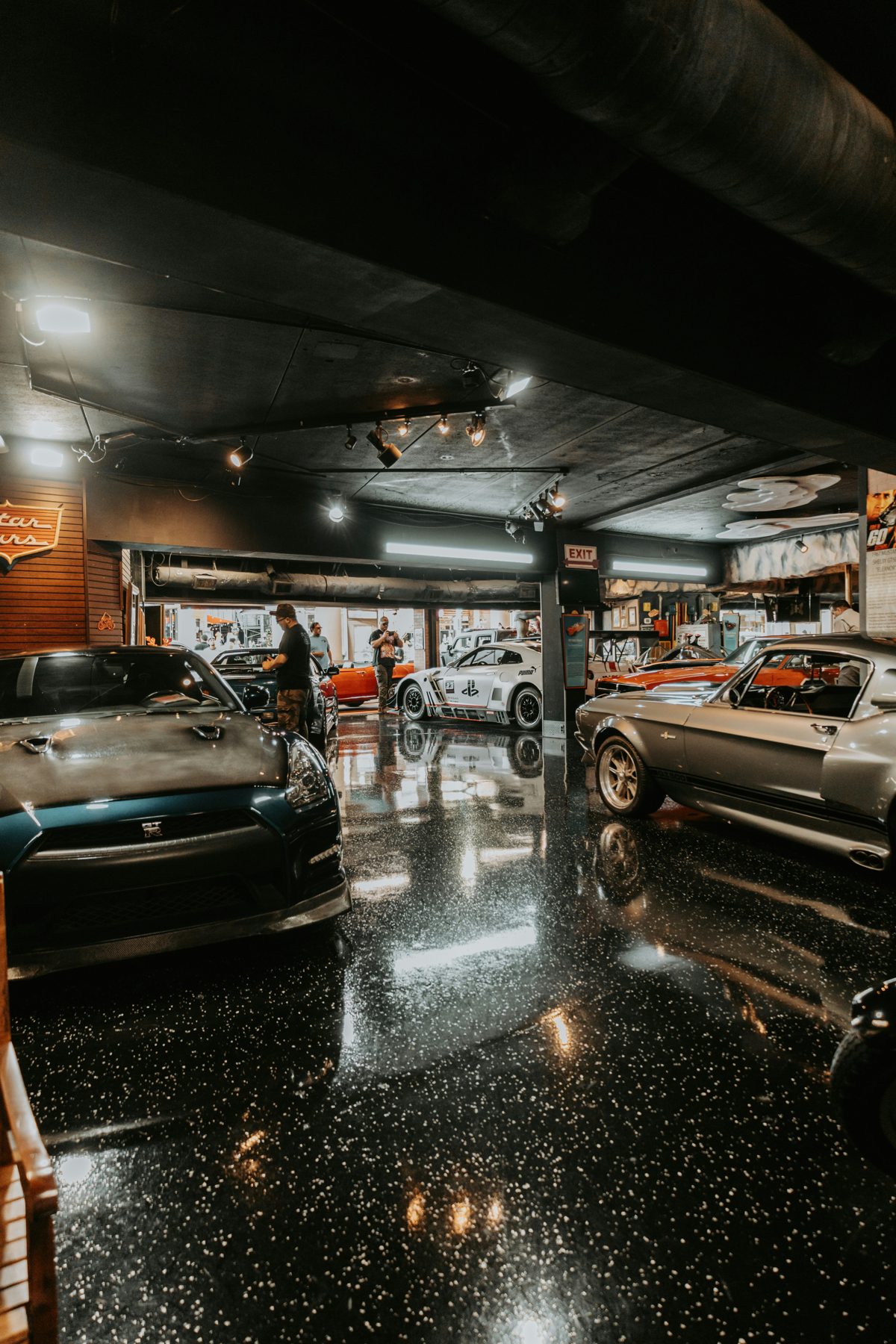 Glossy black flake epoxy floor in a car showroom